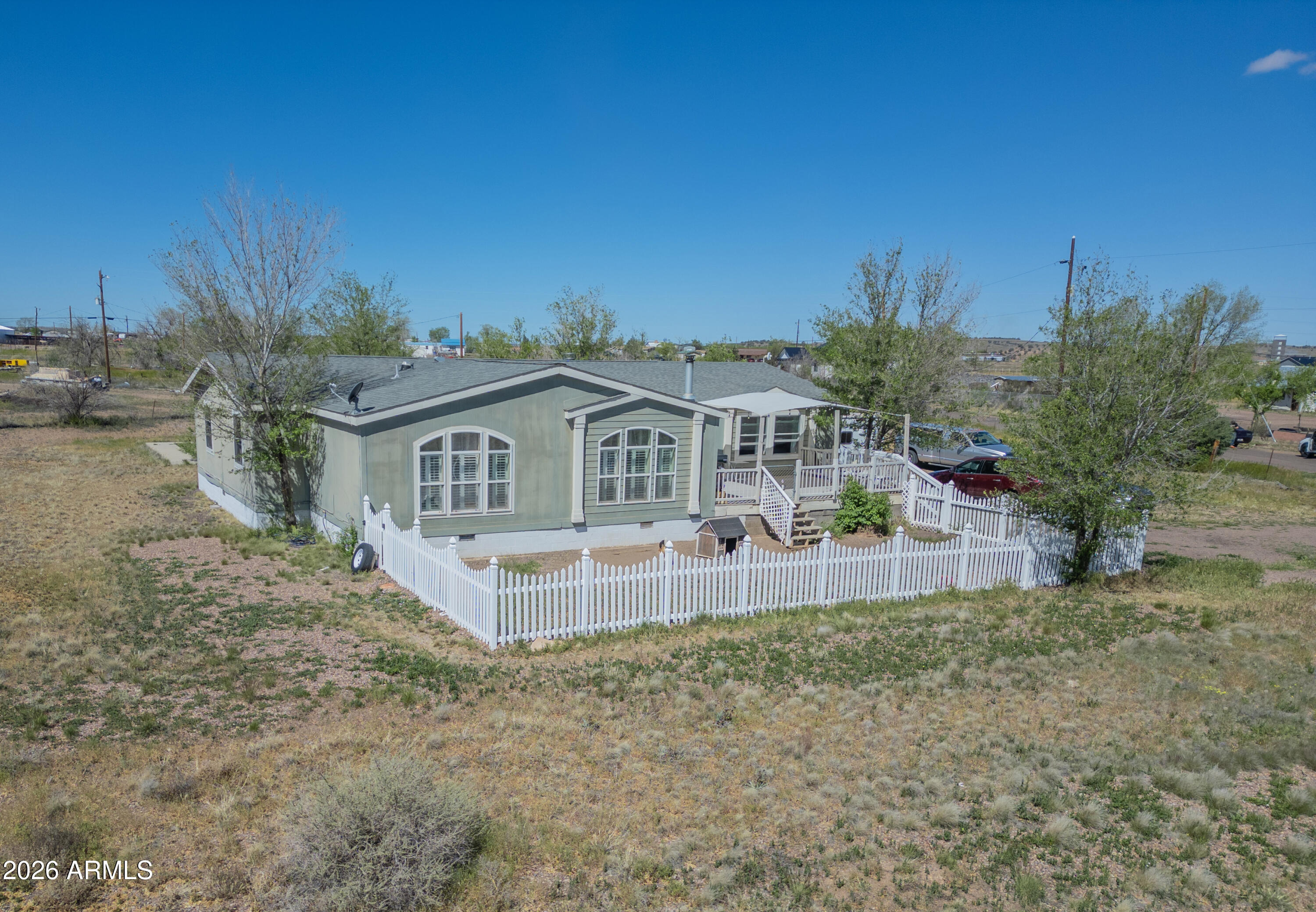 1401 Ranch Road Taylor, AZ 85939 - Photo 3 of 61 a front view of a house with a yard