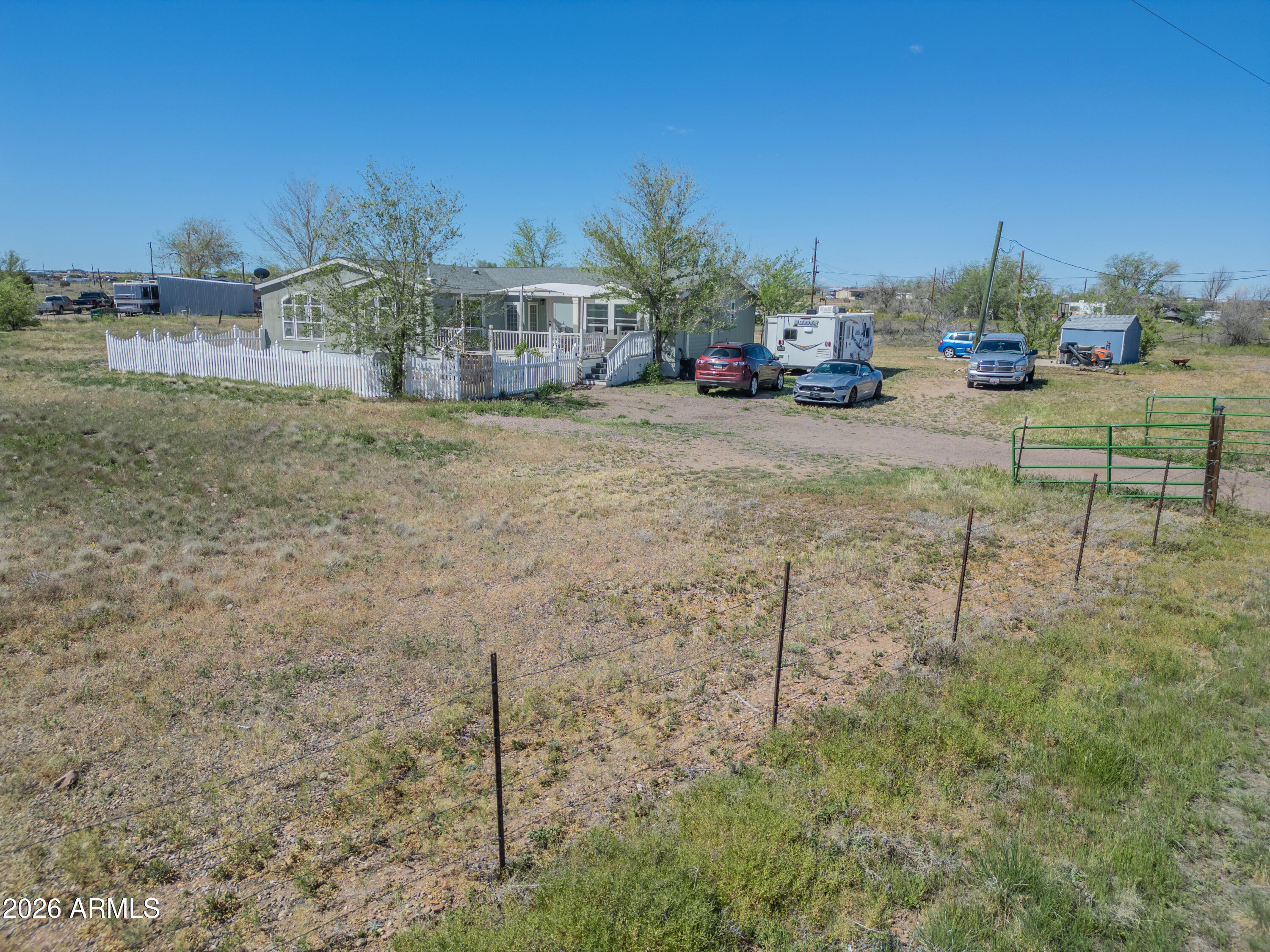 1401 Ranch Road Taylor, AZ 85939 - Photo 4 of 61 a view of a house with a yard and sitting area