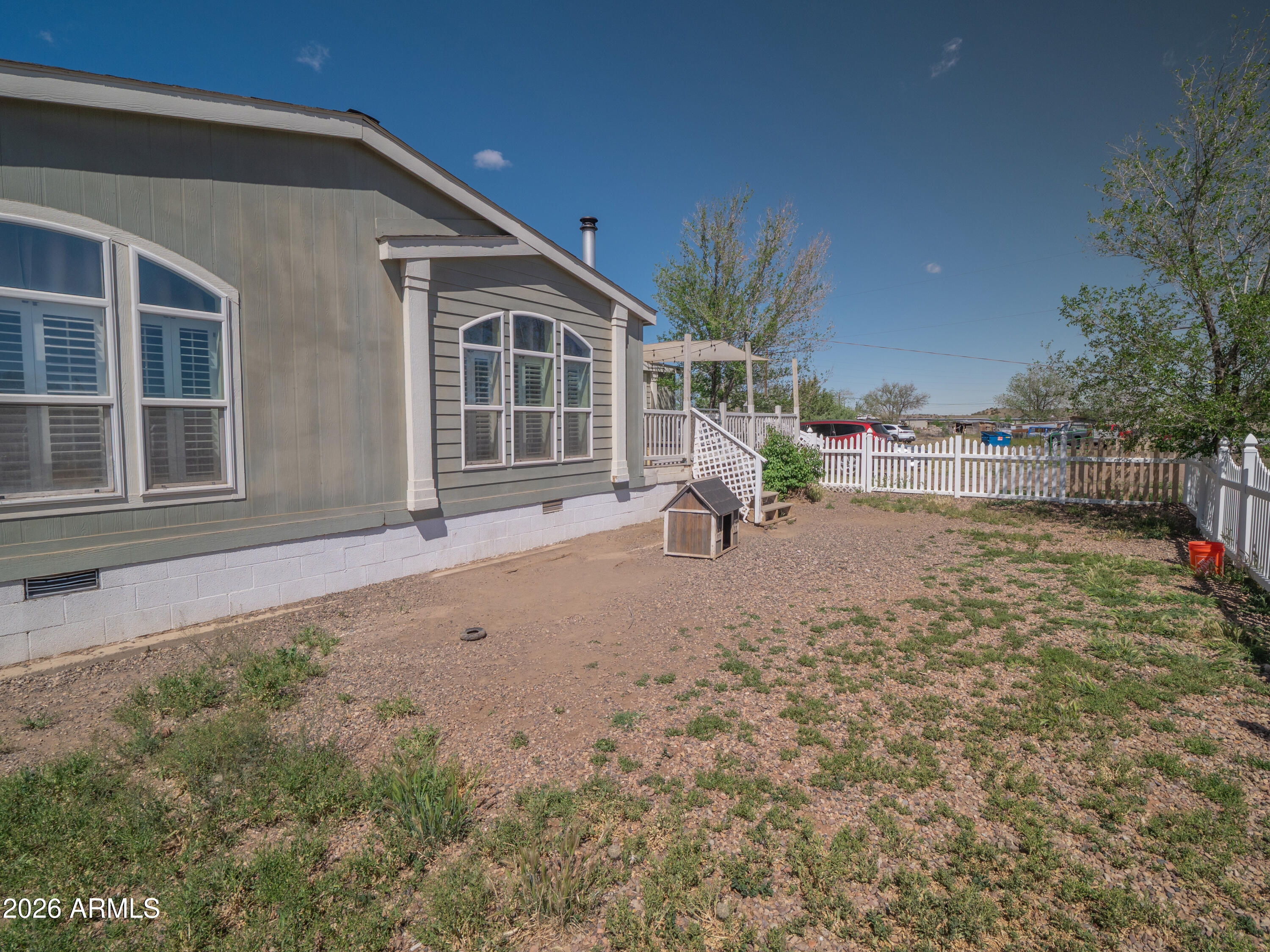1401 Ranch Road Taylor, AZ 85939 - Photo 46 of 61 a front view of a house with garden