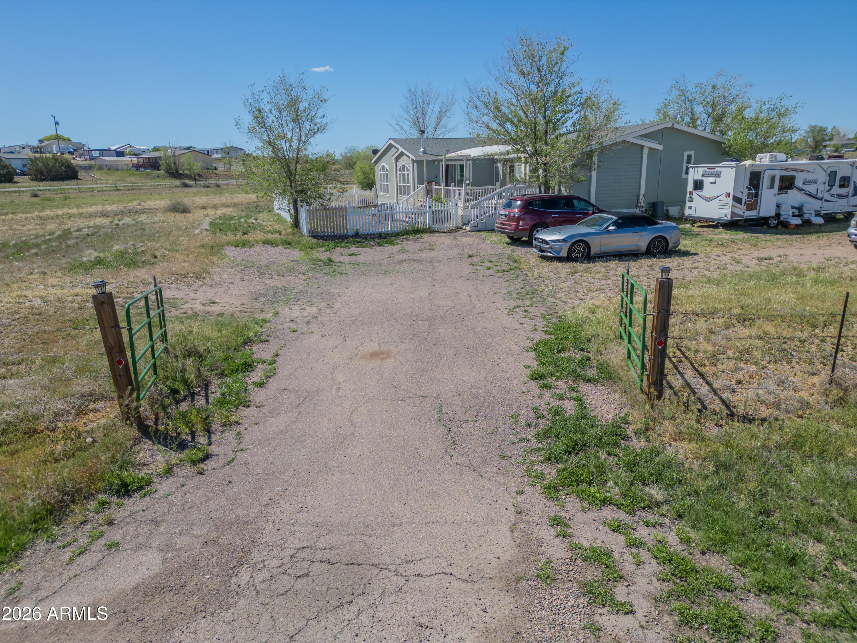 1401 Ranch Road Taylor, AZ 85939 - Photo 5 of 61 a view of a house with backyard and sitting area