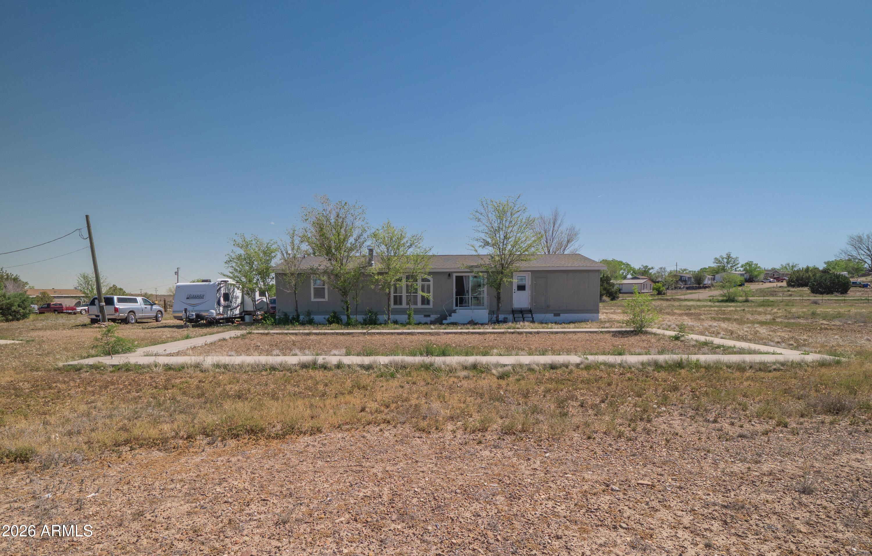 1401 Ranch Road Taylor, AZ 85939 - Photo 53 of 61 a view of a house with a yard