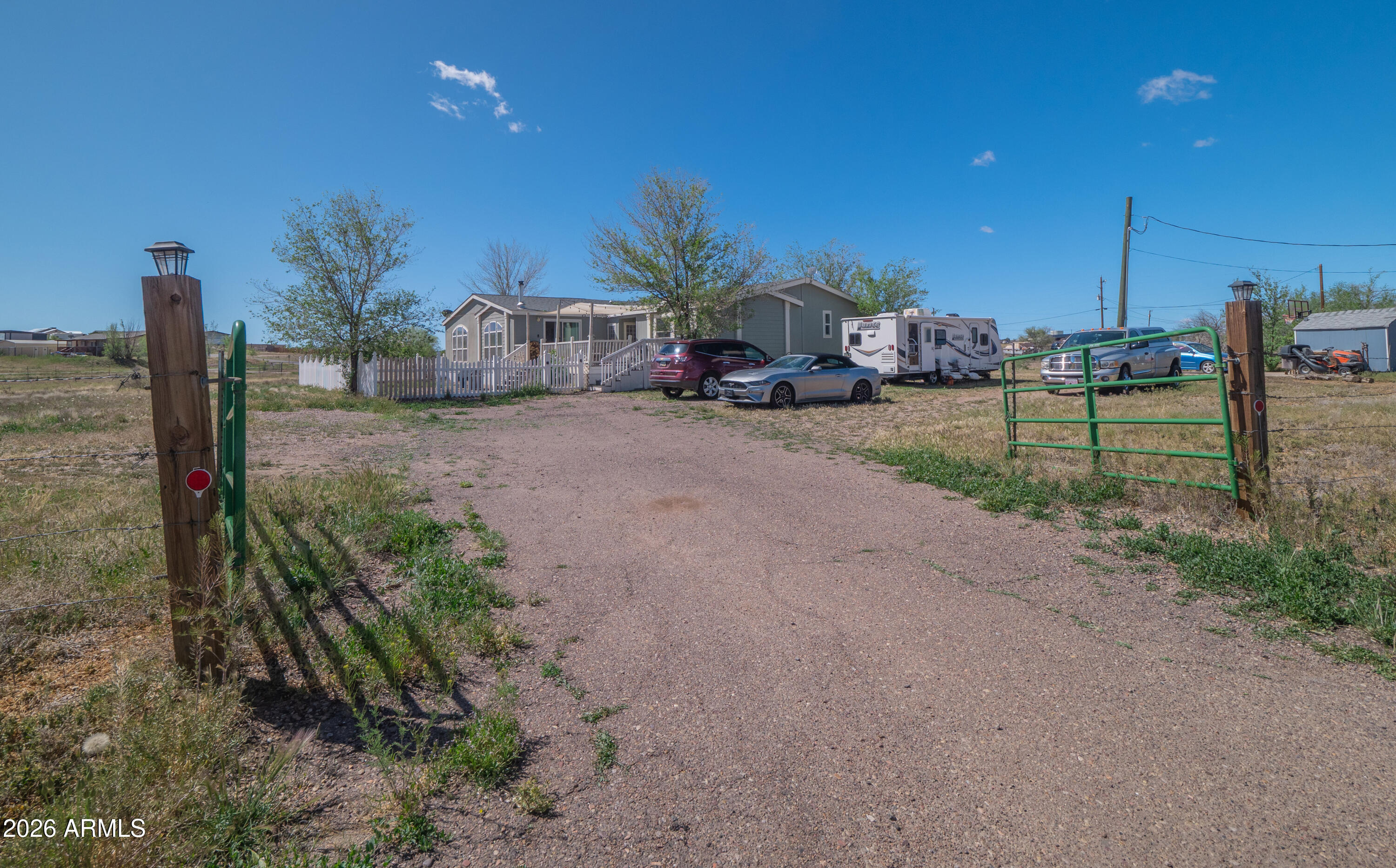 1401 Ranch Road Taylor, AZ 85939 - Photo 6 of 61 a view of a house with backyard and chair
