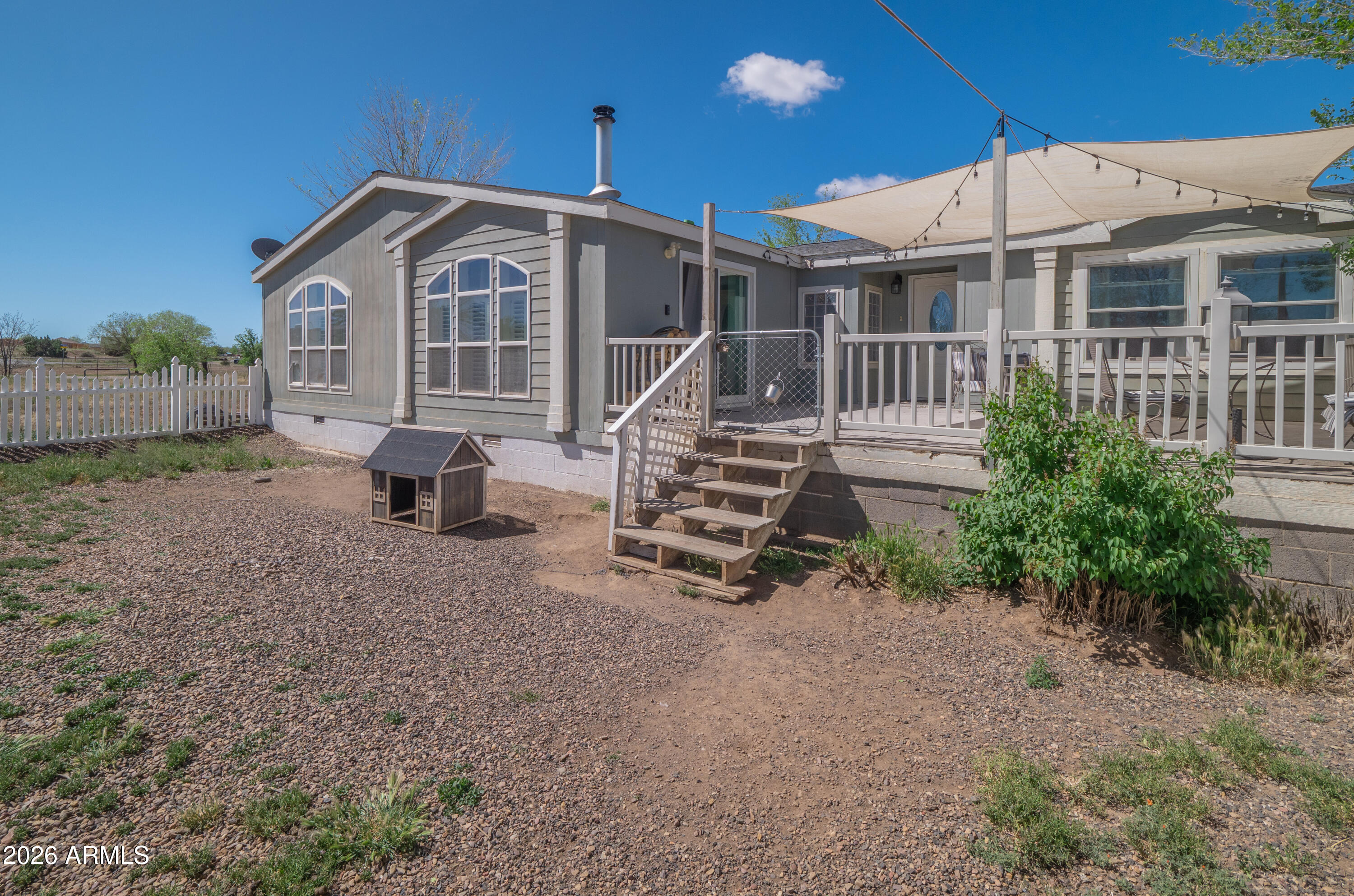 1401 Ranch Road Taylor, AZ 85939 - Photo 9 of 61 a front view of a house with garden