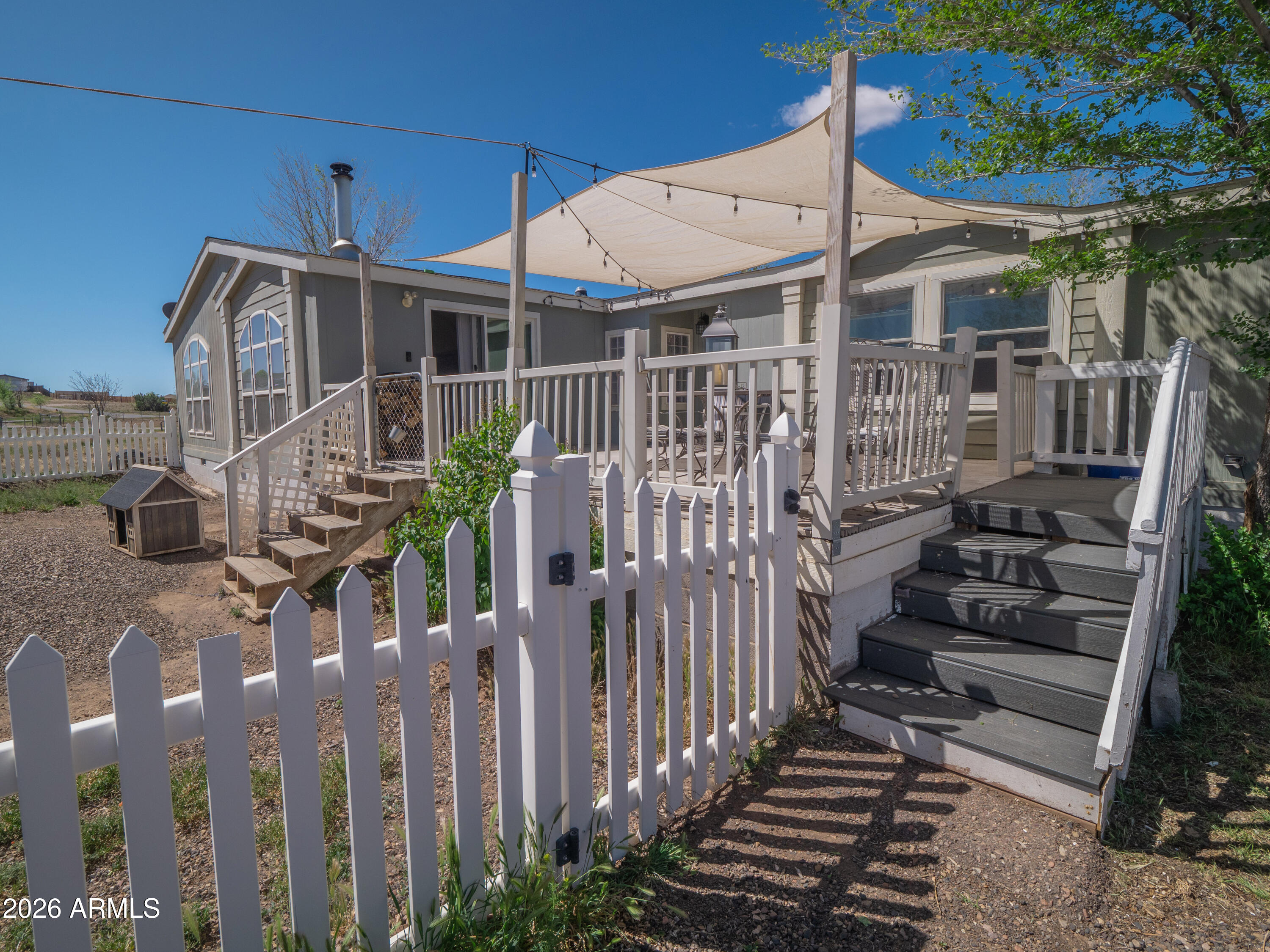 1401 Ranch Road Taylor, AZ 85939 - Photo 10 of 61 a view of a house with wooden fence