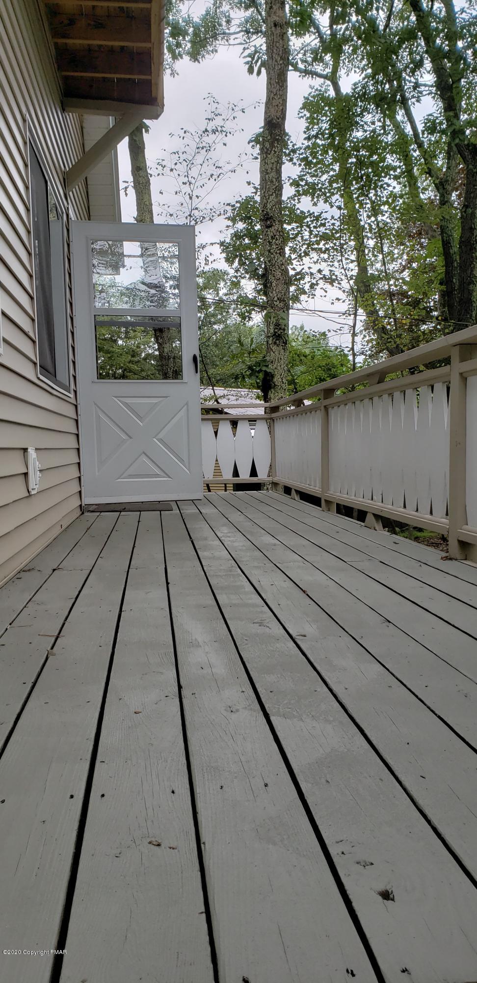 164 Spring Drive Dingmans Ferry, PA 18328 - Photo 7 of 11 a view of a backyard