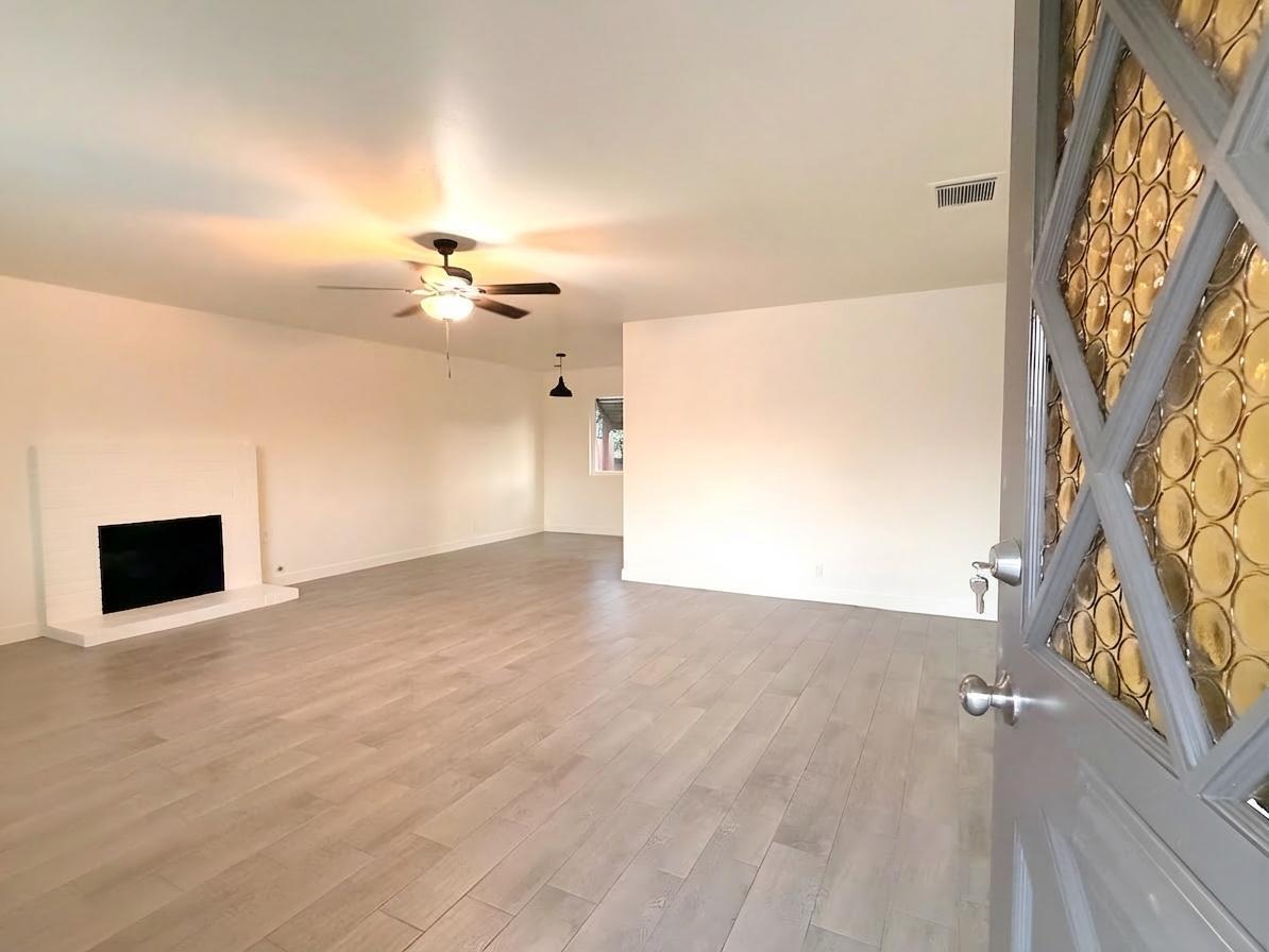 302 Sequoia Drive Exeter, CA 93221 - Photo 3 of 20 a view of a livingroom with a fireplace