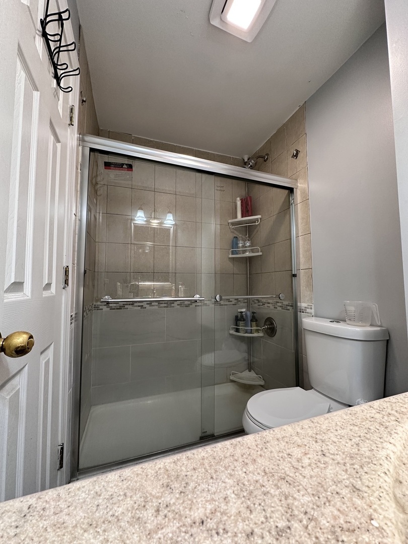263 Blackberry Drive Bolingbrook, IL 60440 - Photo 11 of 50 a bathroom with a sink and a shower