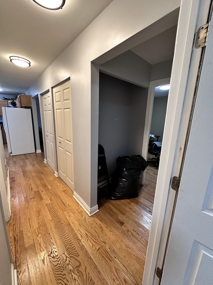 263 Blackberry Drive Bolingbrook, IL 60440 - Photo 12 of 50 a bedroom with a bed and a mirror