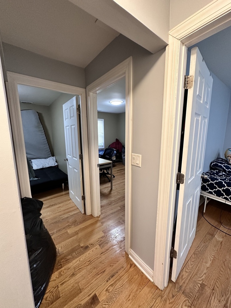 263 Blackberry Drive Bolingbrook, IL 60440 - Photo 13 of 50 a view of a hallway view with wooden floor and staircase