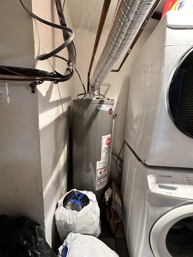 263 Blackberry Drive Bolingbrook, IL 60440 - Photo 25 of 50 a bathroom with a toilet and a mirror