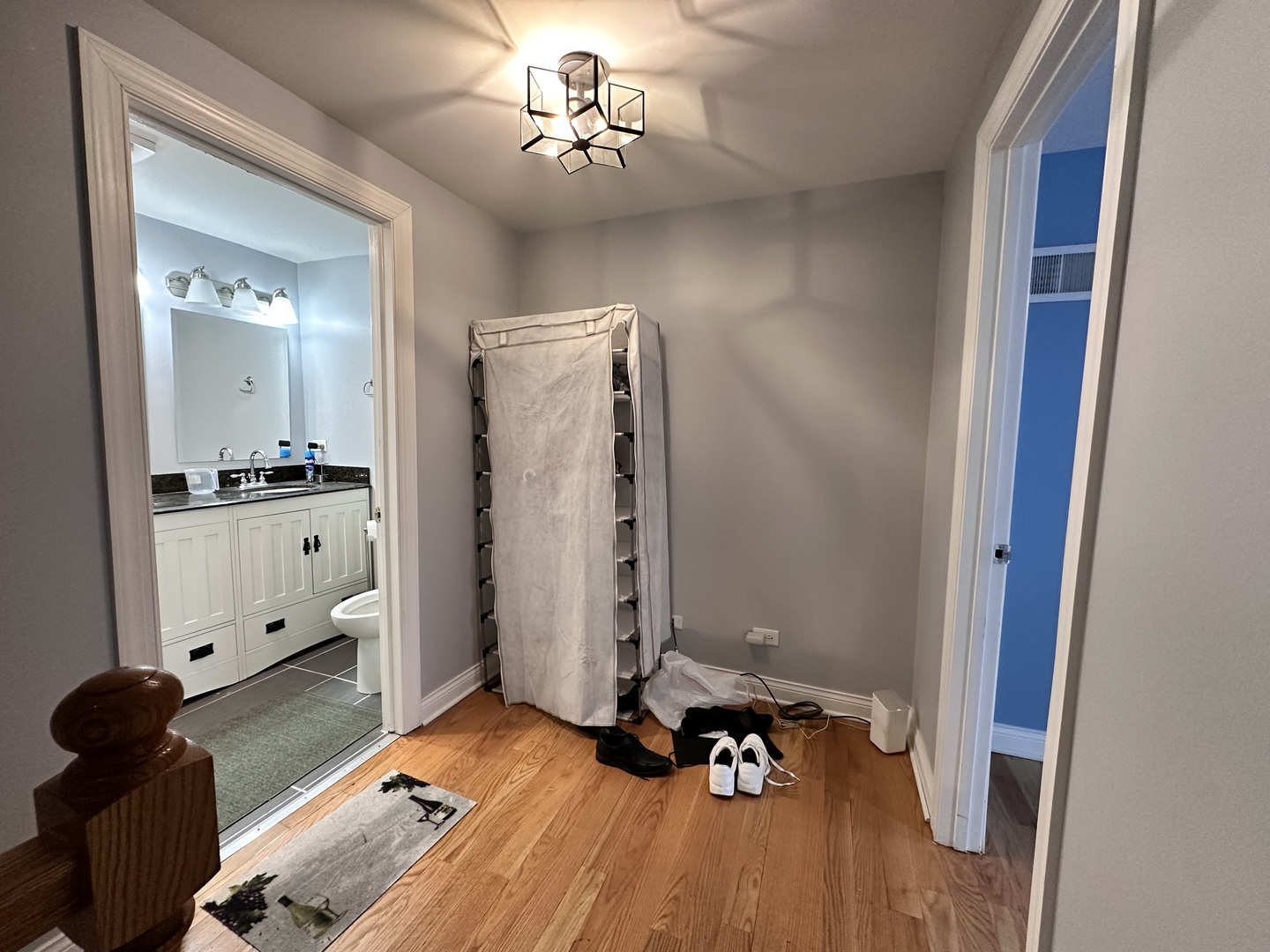 263 Blackberry Drive Bolingbrook, IL 60440 - Photo 27 of 50 a view of a room with gym equipment and wooden floor