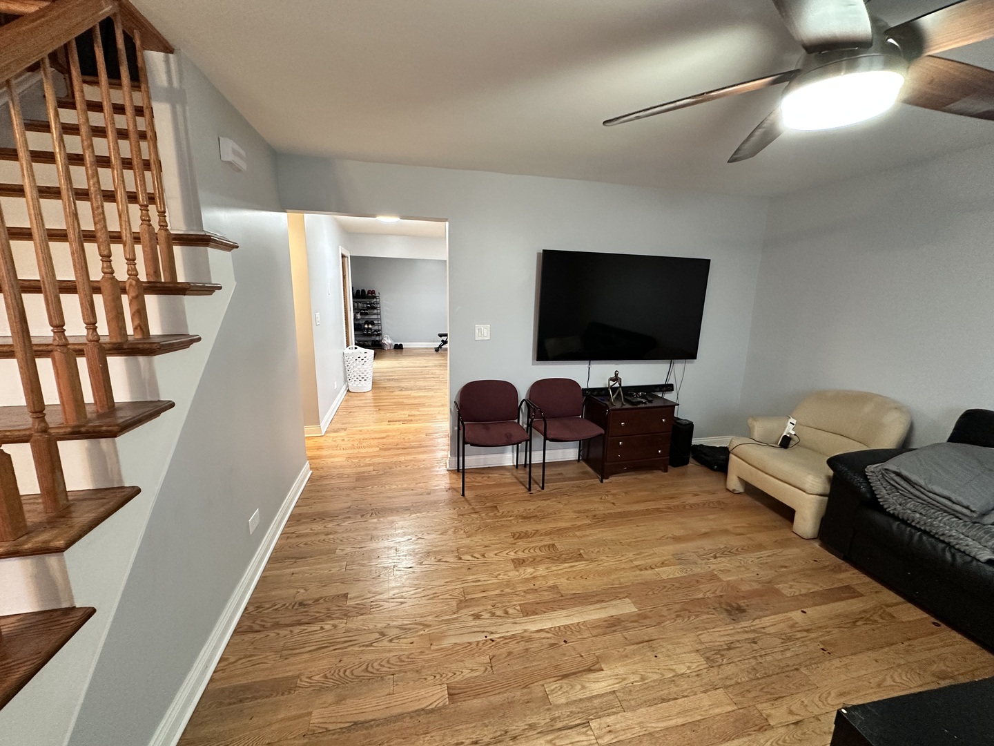 263 Blackberry Drive Bolingbrook, IL 60440 - Photo 3 of 50 a living room with furniture and a flat screen tv