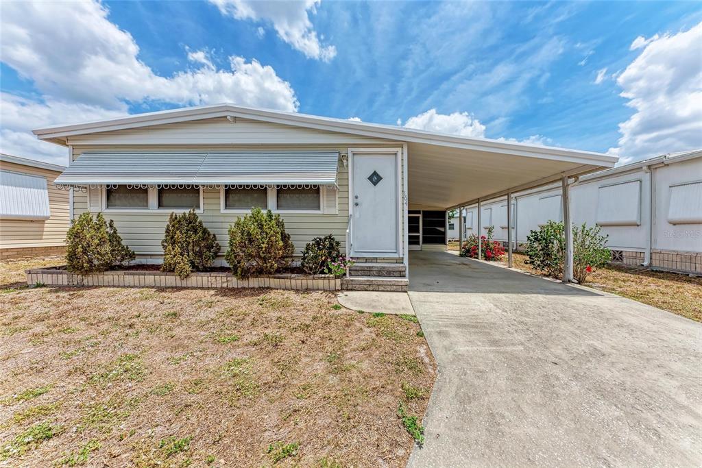 5619 Bayshore Road, Unit 164 Palmetto, FL 34221 - Photo 2 of 42 front view of a house