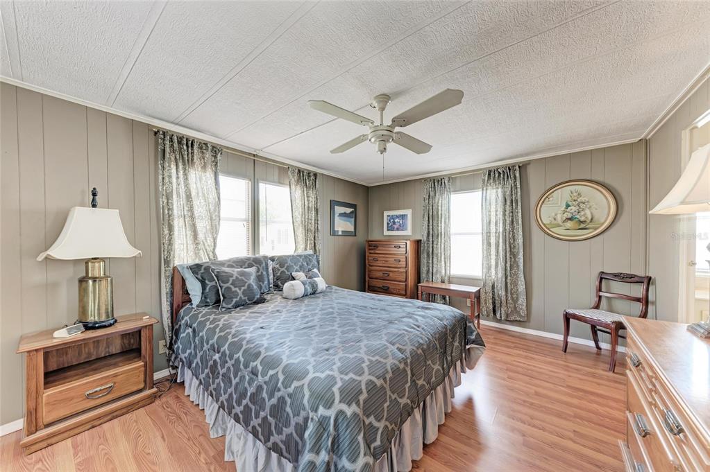 5619 Bayshore Road, Unit 164 Palmetto, FL 34221 - Photo 21 of 42 a living room with a bed furniture and a window