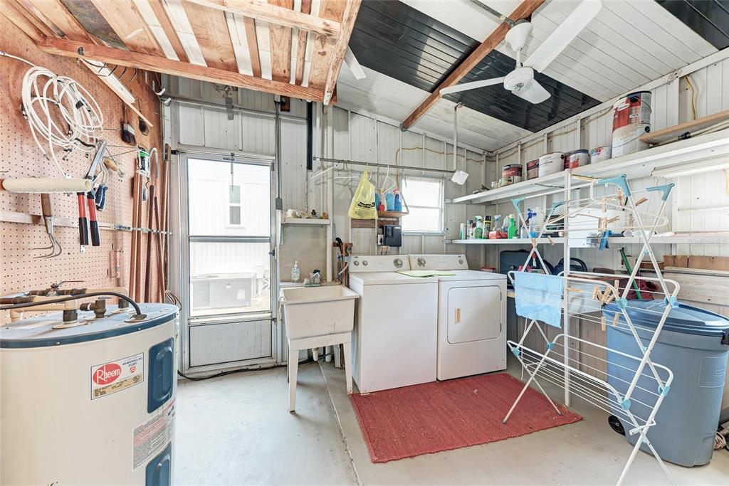 5619 Bayshore Road, Unit 164 Palmetto, FL 34221 - Photo 35 of 42 a utility room with dryer and washer