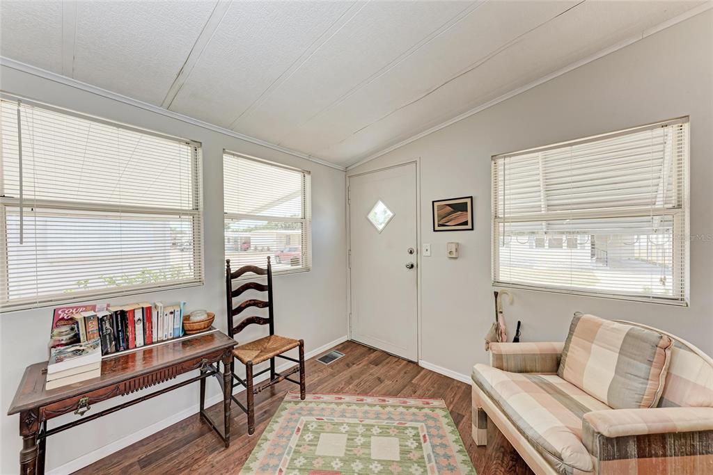 5619 Bayshore Road, Unit 164 Palmetto, FL 34221 - Photo 7 of 42 a bedroom with furniture and a window