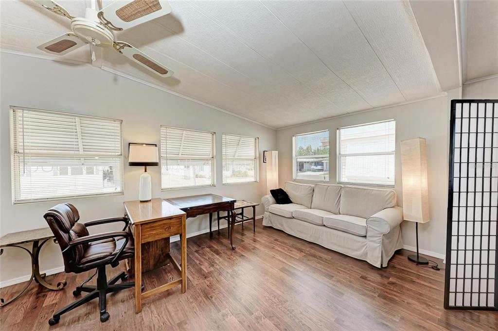 5619 Bayshore Road, Unit 164 Palmetto, FL 34221 - Photo 8 of 42 a living room with furniture and a window