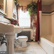 1327 Pentwood Road Baltimore, MD 21239 - Photo 21 of 32 Updated Tiled Full Bath