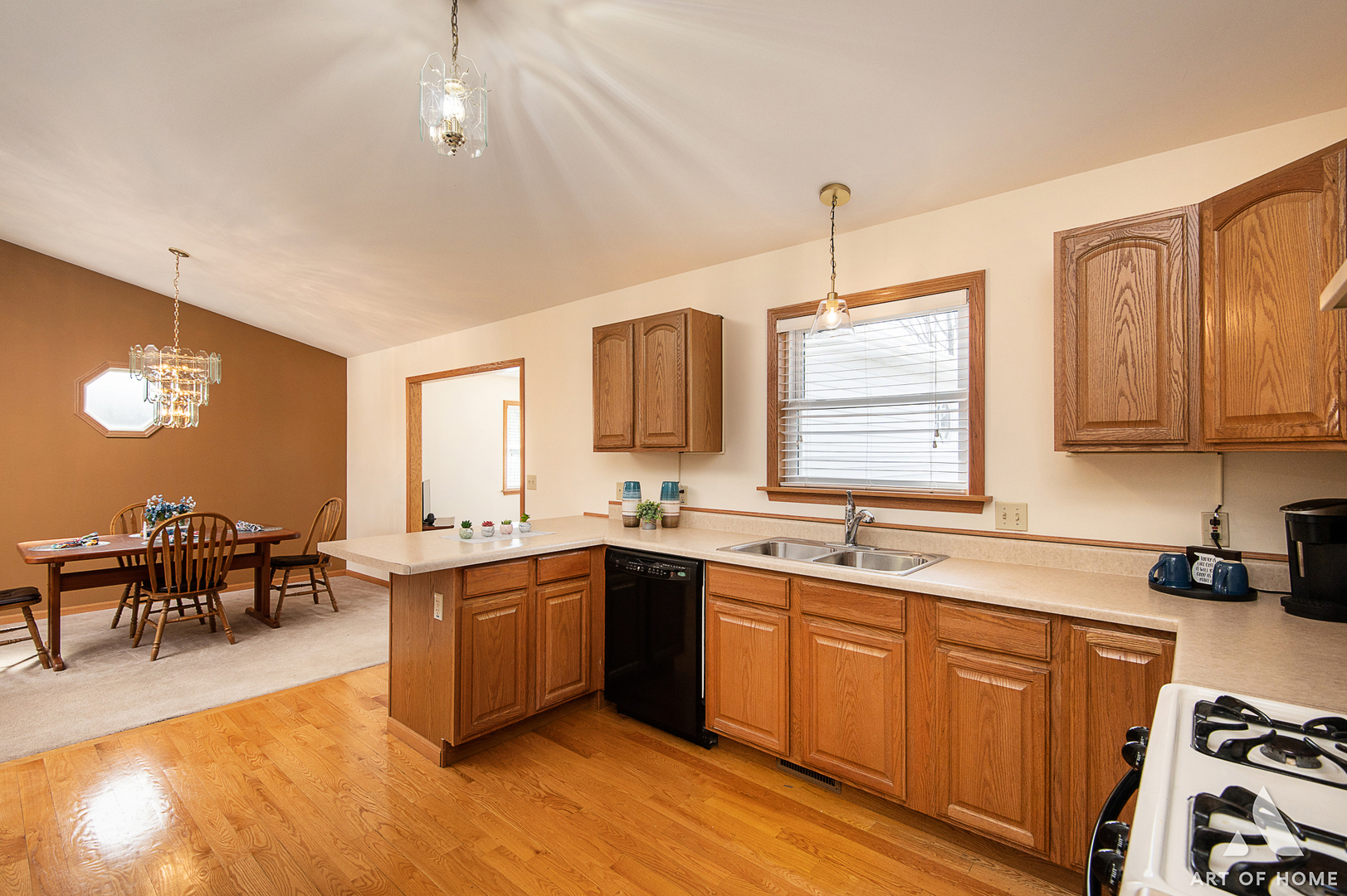 407 Wimbleton Trail McHenry, IL 60050 - Photo 11 of 38 a kitchen with a sink stove and cabinets