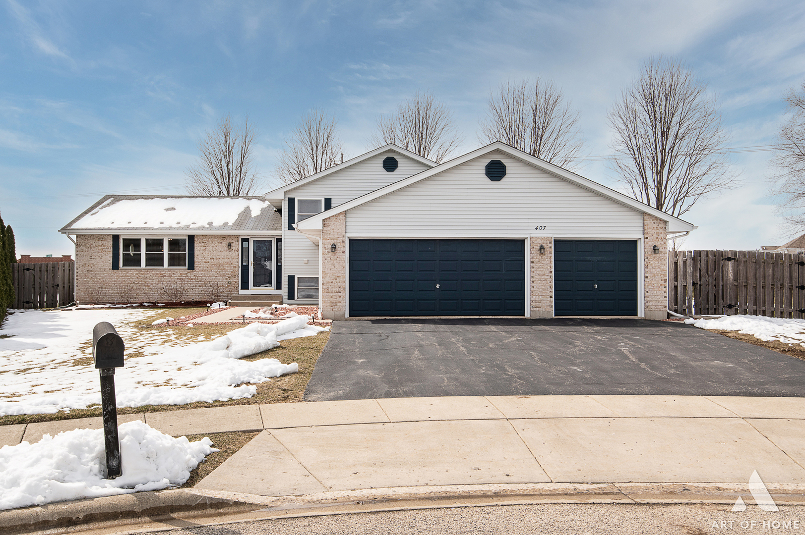 407 Wimbleton Trail McHenry, IL 60050 - Photo 37 of 38 a front view of a house with a yard and garage