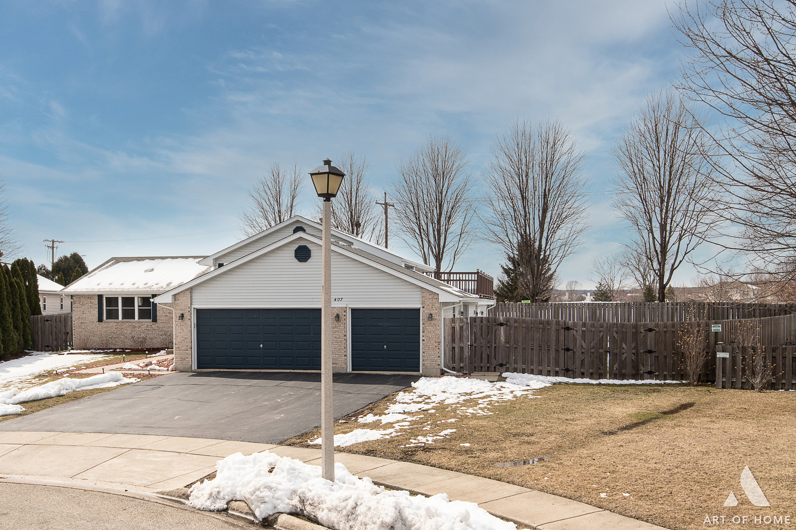 407 Wimbleton Trail McHenry, IL 60050 - Photo 38 of 38 a front view of a house with a yard and garage