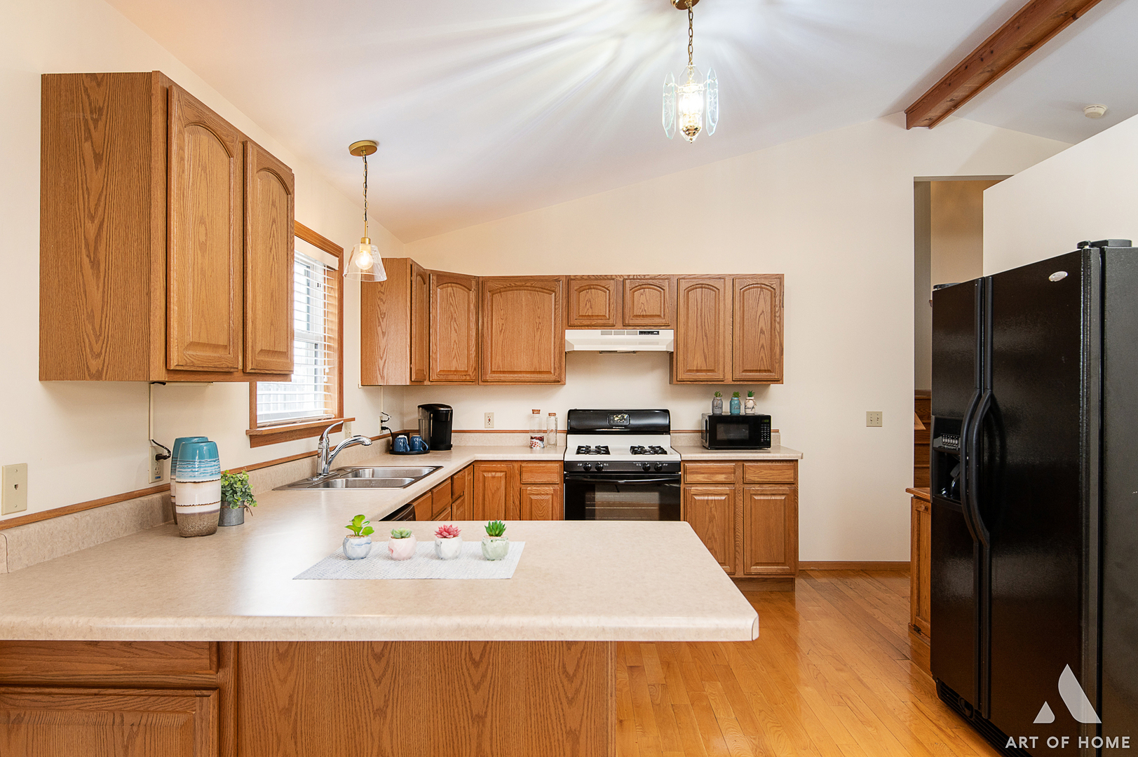 407 Wimbleton Trail McHenry, IL 60050 - Photo 8 of 38 a kitchen with stainless steel appliances a refrigerator sink stove and microwave