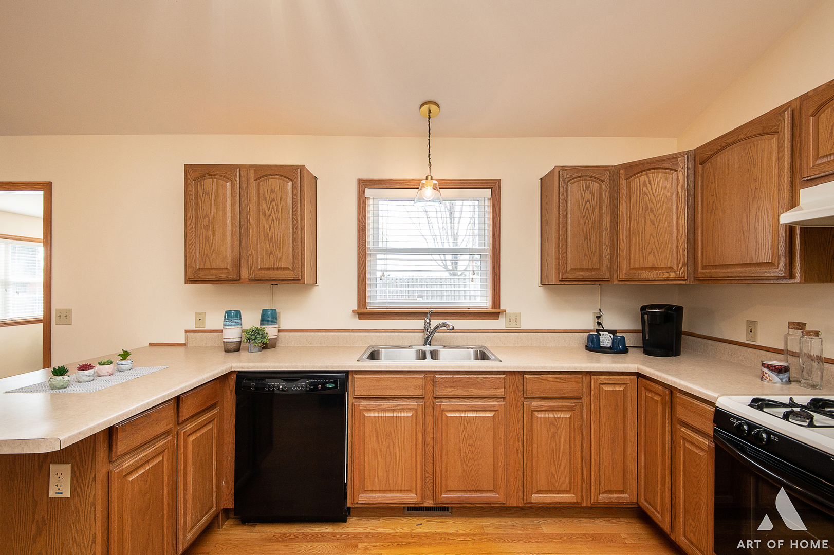 407 Wimbleton Trail McHenry, IL 60050 - Photo 10 of 38 a kitchen with stainless steel appliances a sink stove and cabinets