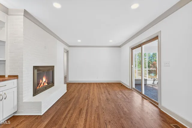a kitchen with a sink and a window
