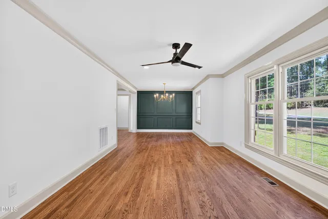 a picture of a bathroom with a shower