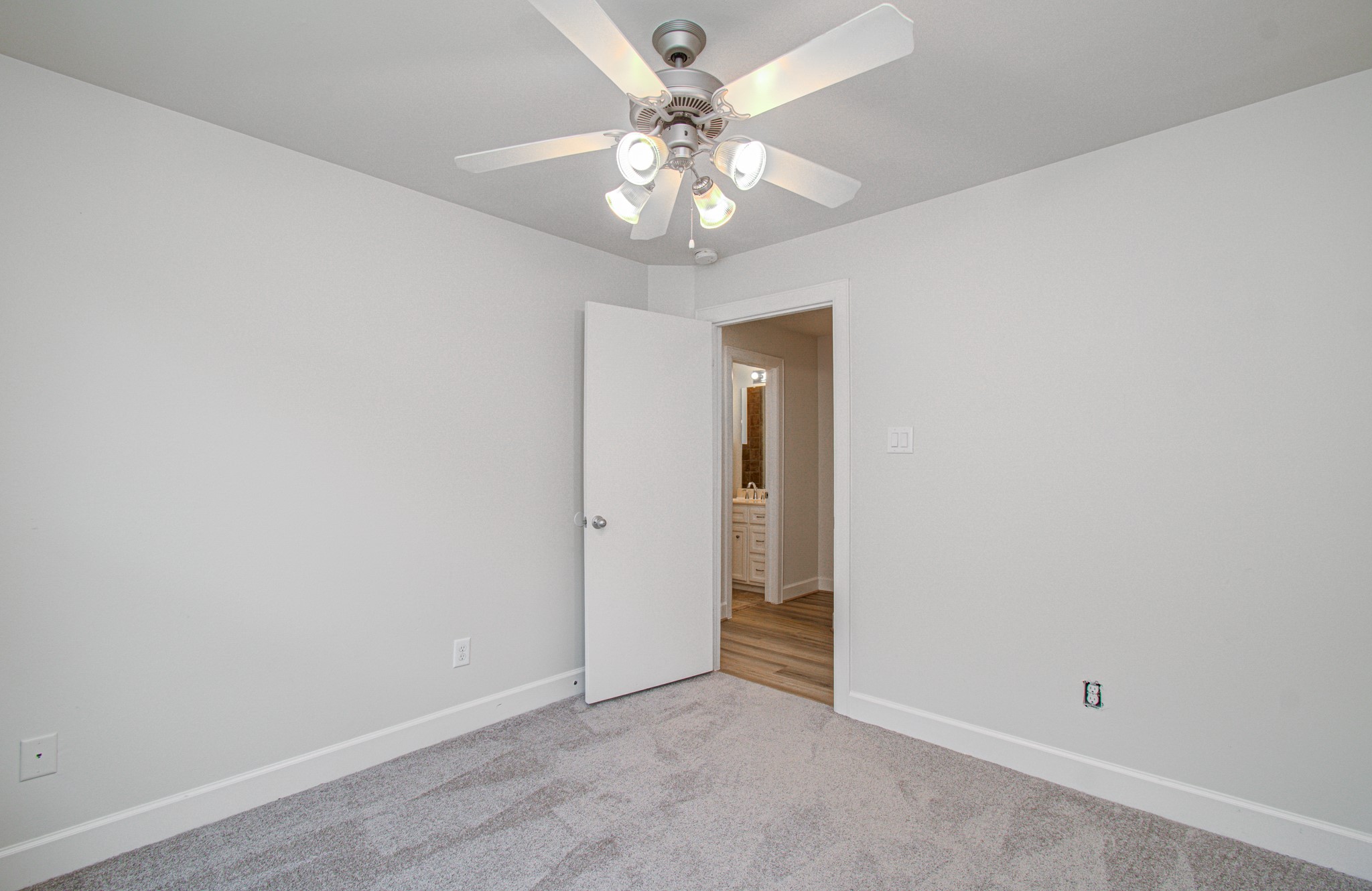 624 East 39th Street Houston, TX 77022 - Photo 32 of 37 a view of an empty room with chandelier fan