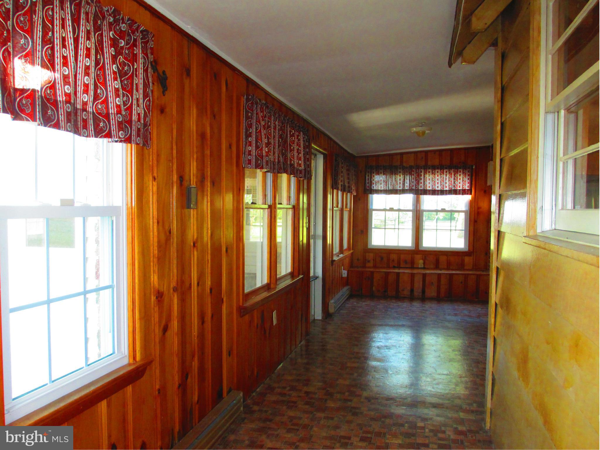 379 Gun Club Road Stephenson, VA 22656 - Photo 27 of 30 Spacious Enclosed Porch