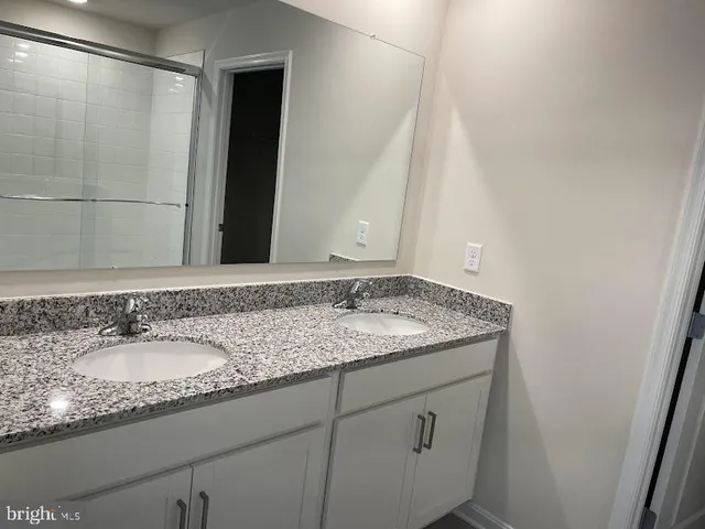 a bathroom with a toilet and a bathtub