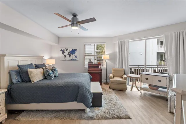 a bedroom with a bed and a couch