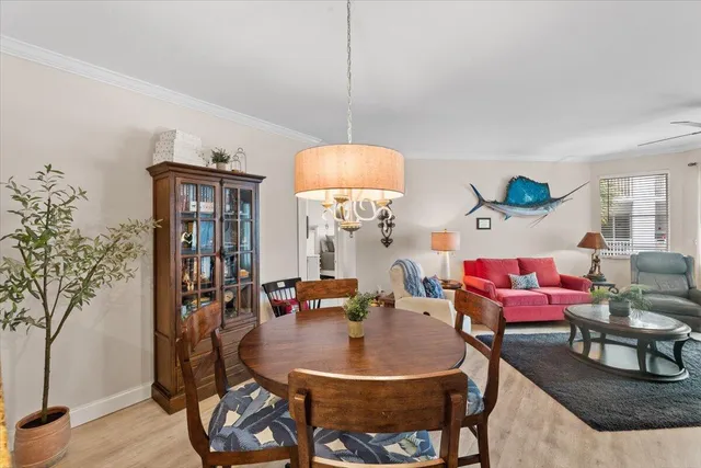 a living room with furniture a table and decor