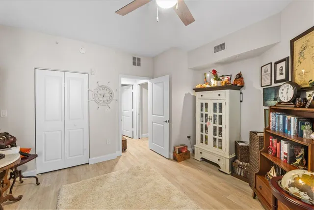 a view of a livingroom with shelves