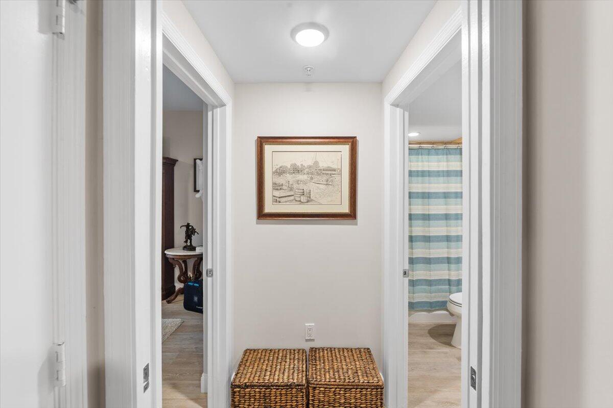 815 Northwest Flagler Avenue, Unit 201 Stuart, FL 34994 - Photo 26 of 43 a view of room with walk in closet and bathroom