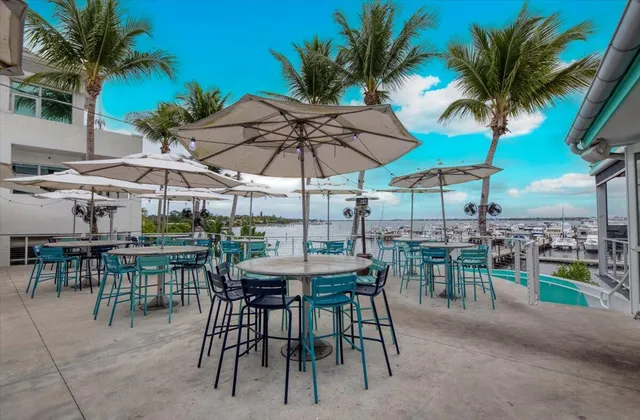 a view of swimming pool with outdoor seating