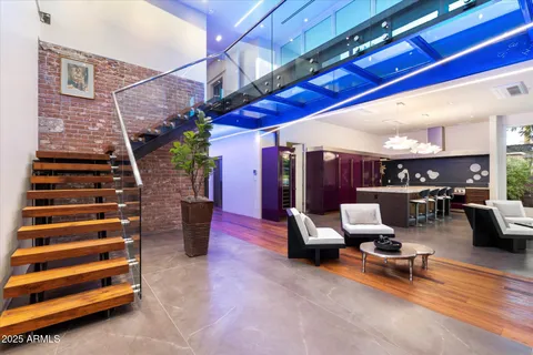 a bathroom with a sink a mirror and a toilet