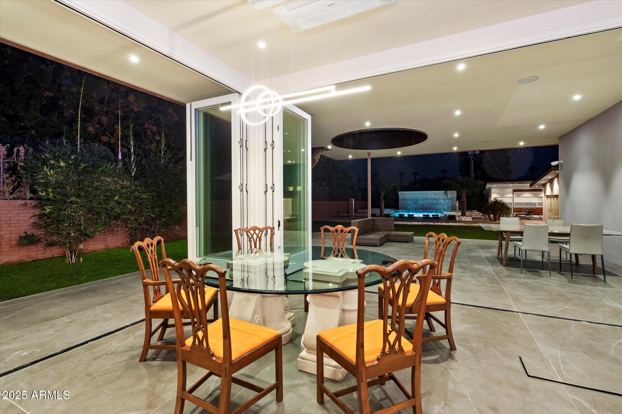 341 East Monte Vista Road Phoenix, AZ 85004 - Photo 23 of 77 a view of a dining room with furniture