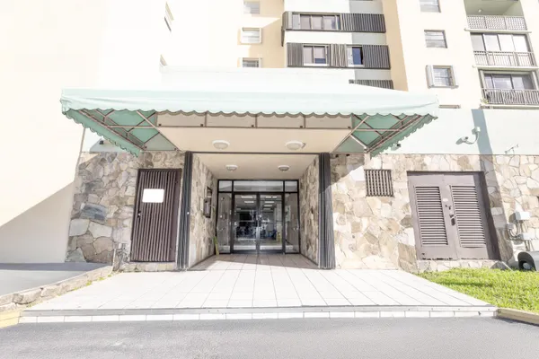 a view of a building and a street