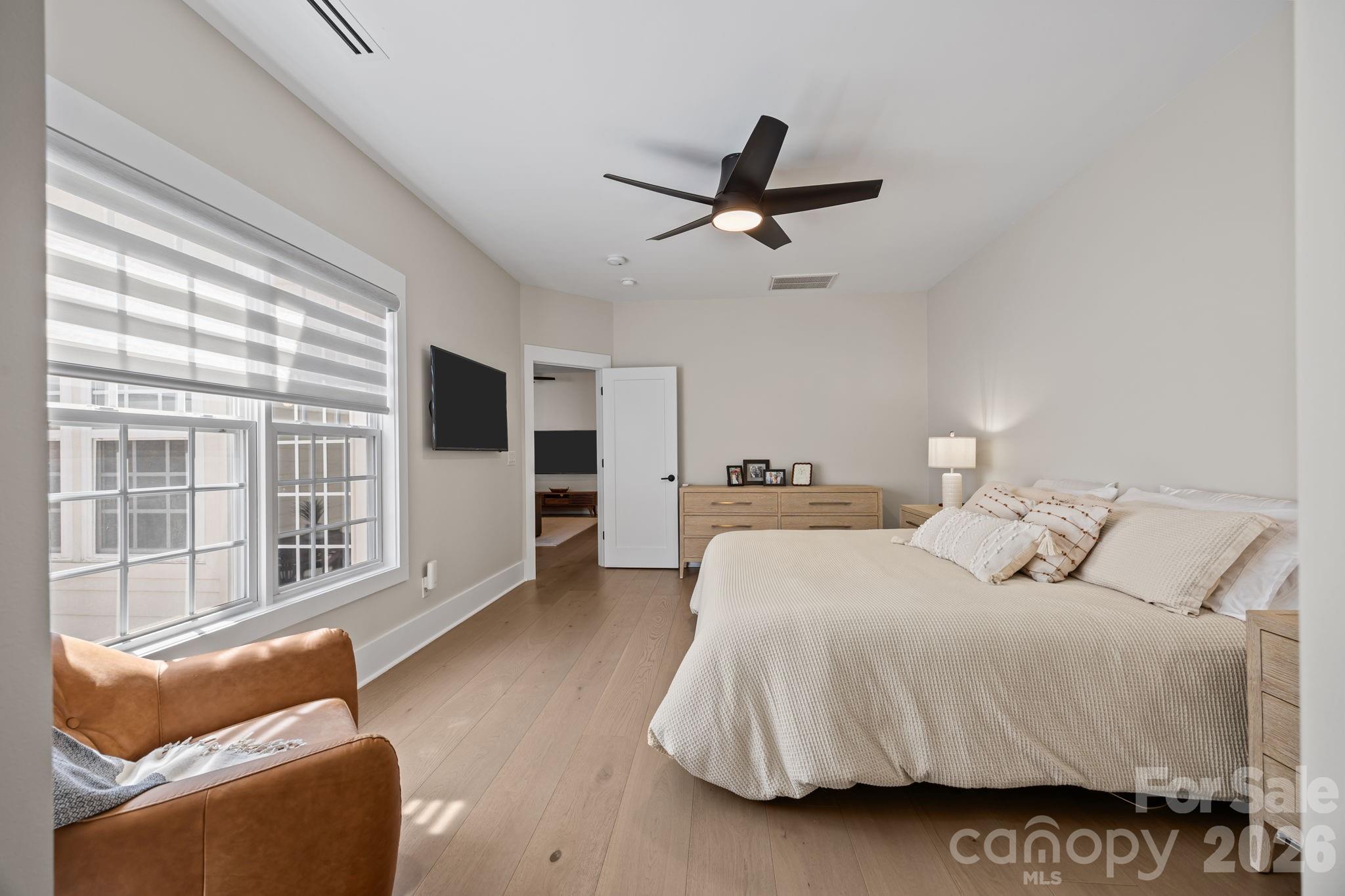241 North Faulkner Way Davidson, NC 28036 - Photo 19 of 39 a bedroom with furniture and windows