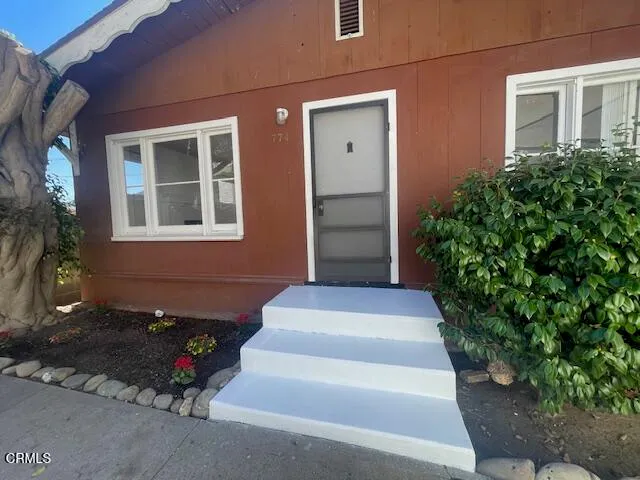 a view of house and front door