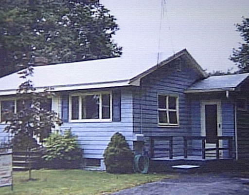 12 North Martin Road Amesbury, MA 01913 - Photo 1 of 1 a front view of a house with garden