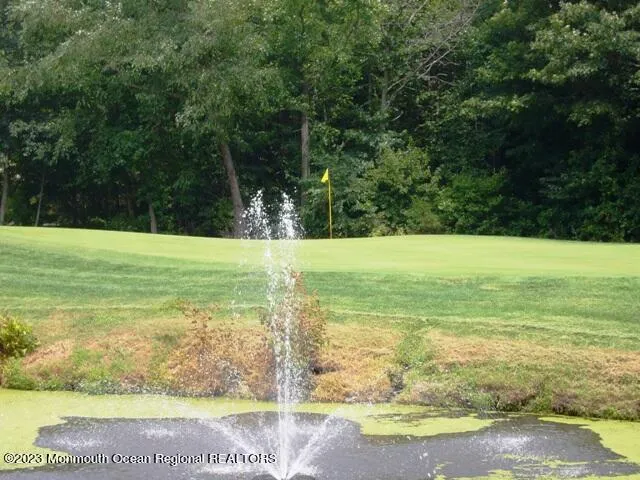 a view of a ocean with a beach