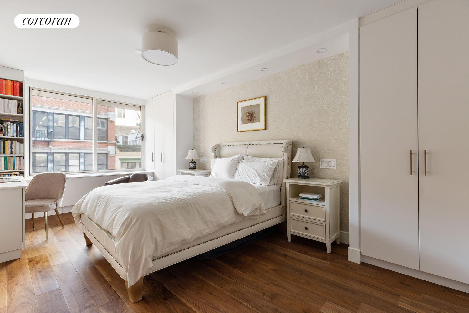 170 East 87th Street, Unit W7C Manhattan, NY 10128 - Photo 10 of 15 a bedroom with a bed and a chair