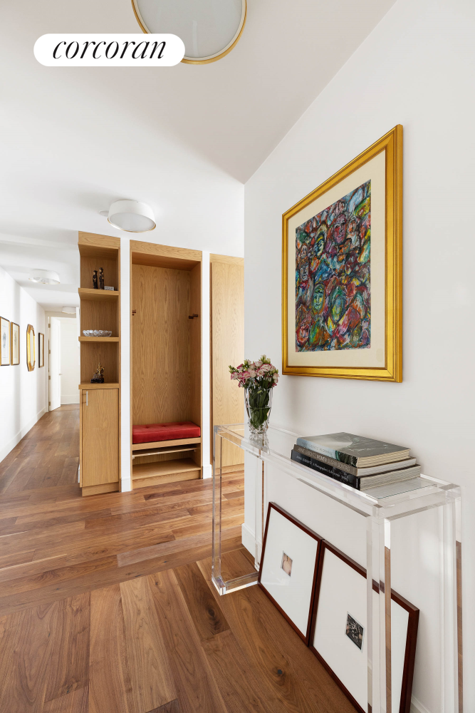 170 East 87th Street, Unit W7C Manhattan, NY 10128 - Photo 7 of 15 a living room with wooden floor and furniture