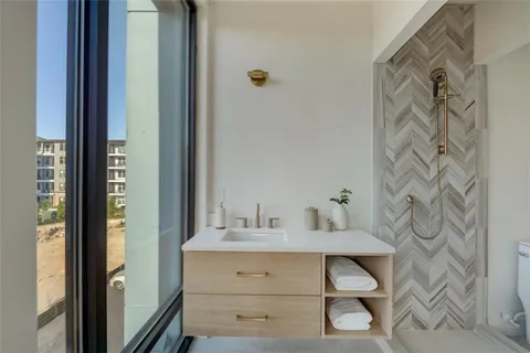 a bathroom with a sink toilet and bathtub