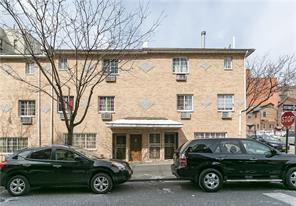 a car parked in front of a house