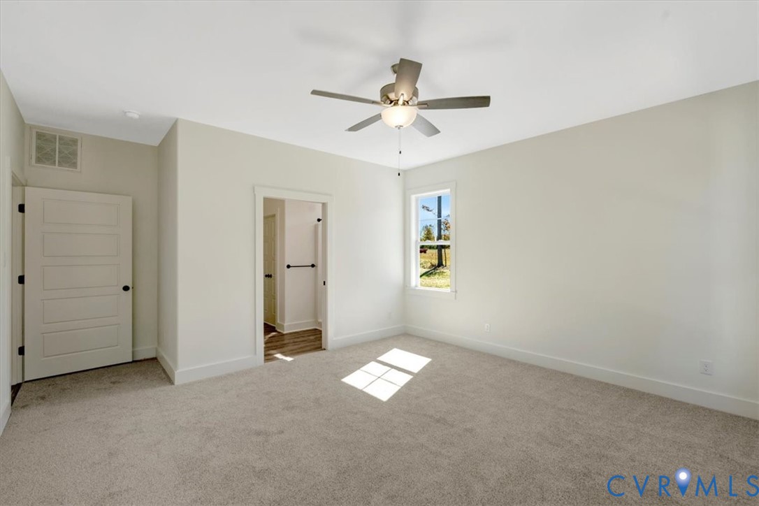4752 Country Club Road La Crosse, VA 23950 - Photo 24 of 35 a view of an empty room with a window