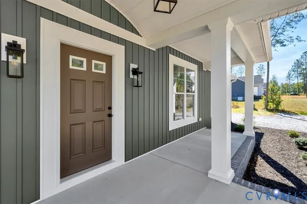 a view of livingroom with furniture and windows